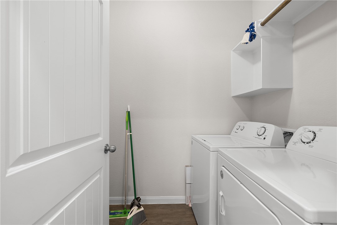 4702 Nopalitos Way Bryan, TX 77807 - Photo 21 of 27 a view of storage and utility room with washer and dryer