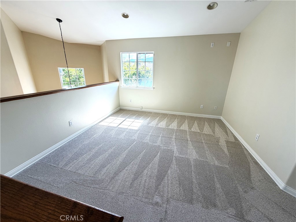 873 Greenridge Road Corona, CA 92882 - Photo 28 of 30 an empty room with windows