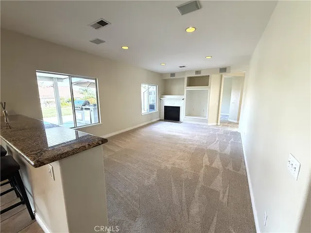 a view of a livingroom with a staircase