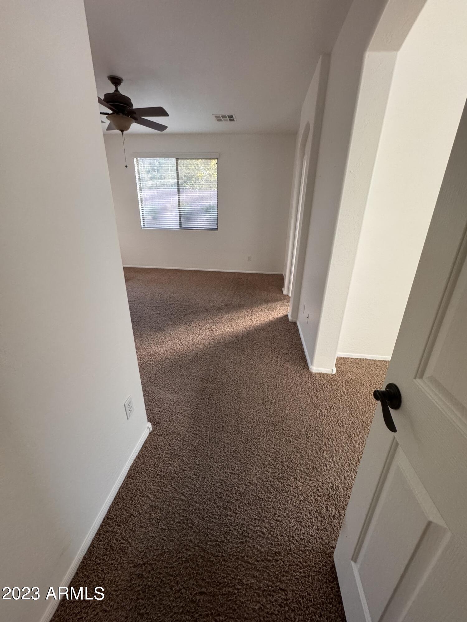 3753 East Phelps Street Gilbert, AZ 85295 - Photo 11 of 18 an empty room with windows
