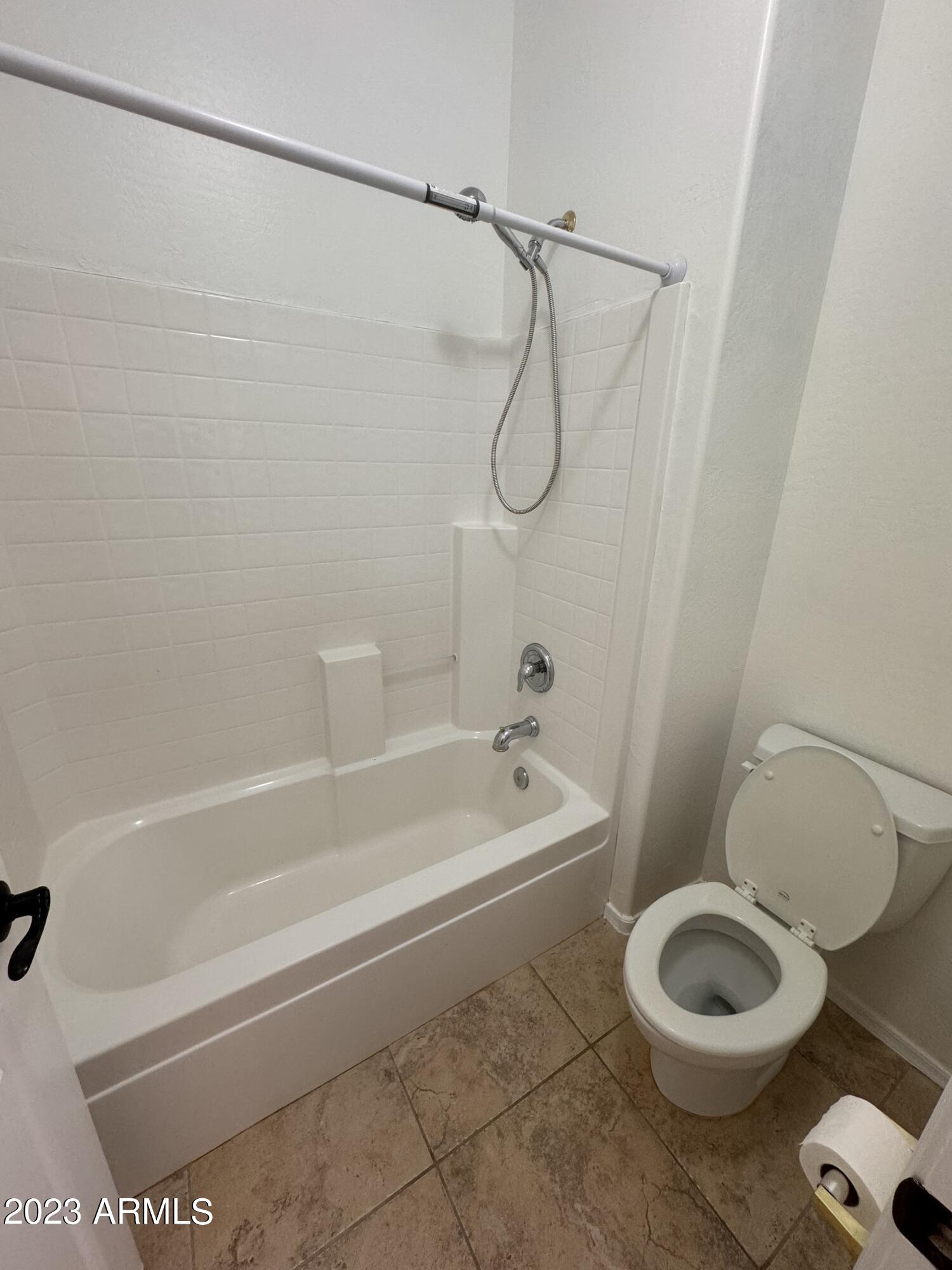 3753 East Phelps Street Gilbert, AZ 85295 - Photo 18 of 18 a bathroom with a toilet and a shower