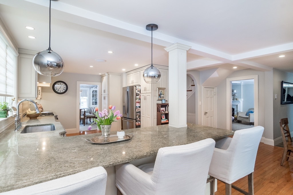 20 Colburn Road Wellesley, MA 02481 - Photo 11 of 31 a living room with furniture kitchen and a chandelier