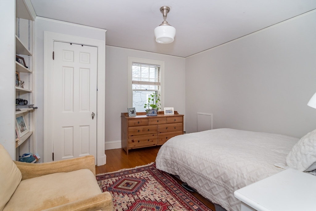 20 Colburn Road Wellesley, MA 02481 - Photo 16 of 31 a bedroom with a bed and furniture