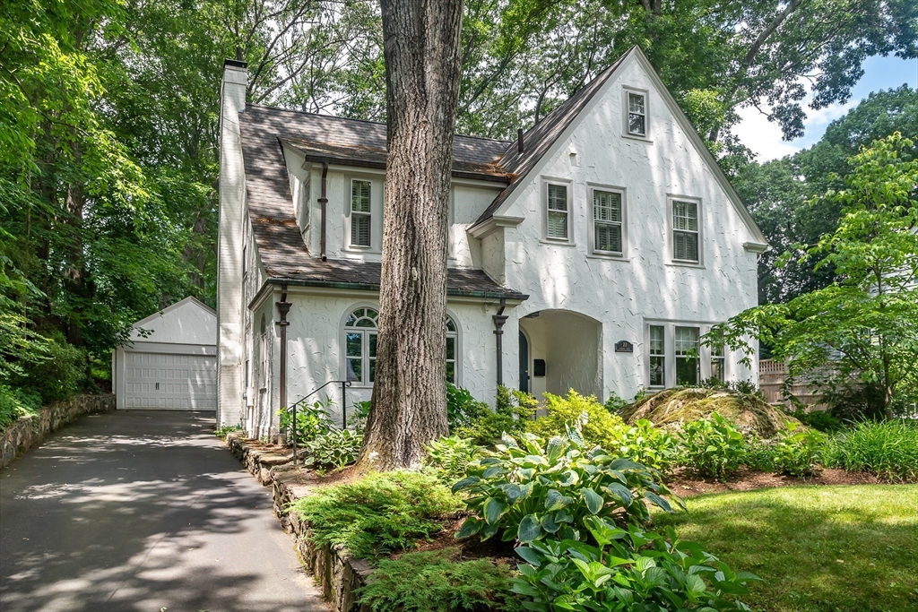 20 Colburn Road Wellesley, MA 02481 - Photo 2 of 31 a front view of a house with garden