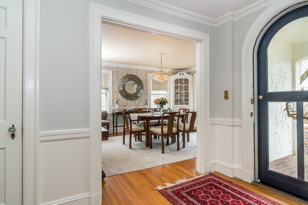 20 Colburn Road Wellesley, MA 02481 - Photo 4 of 31 a view of a dining room and livingroom with furniture window and wooden floor