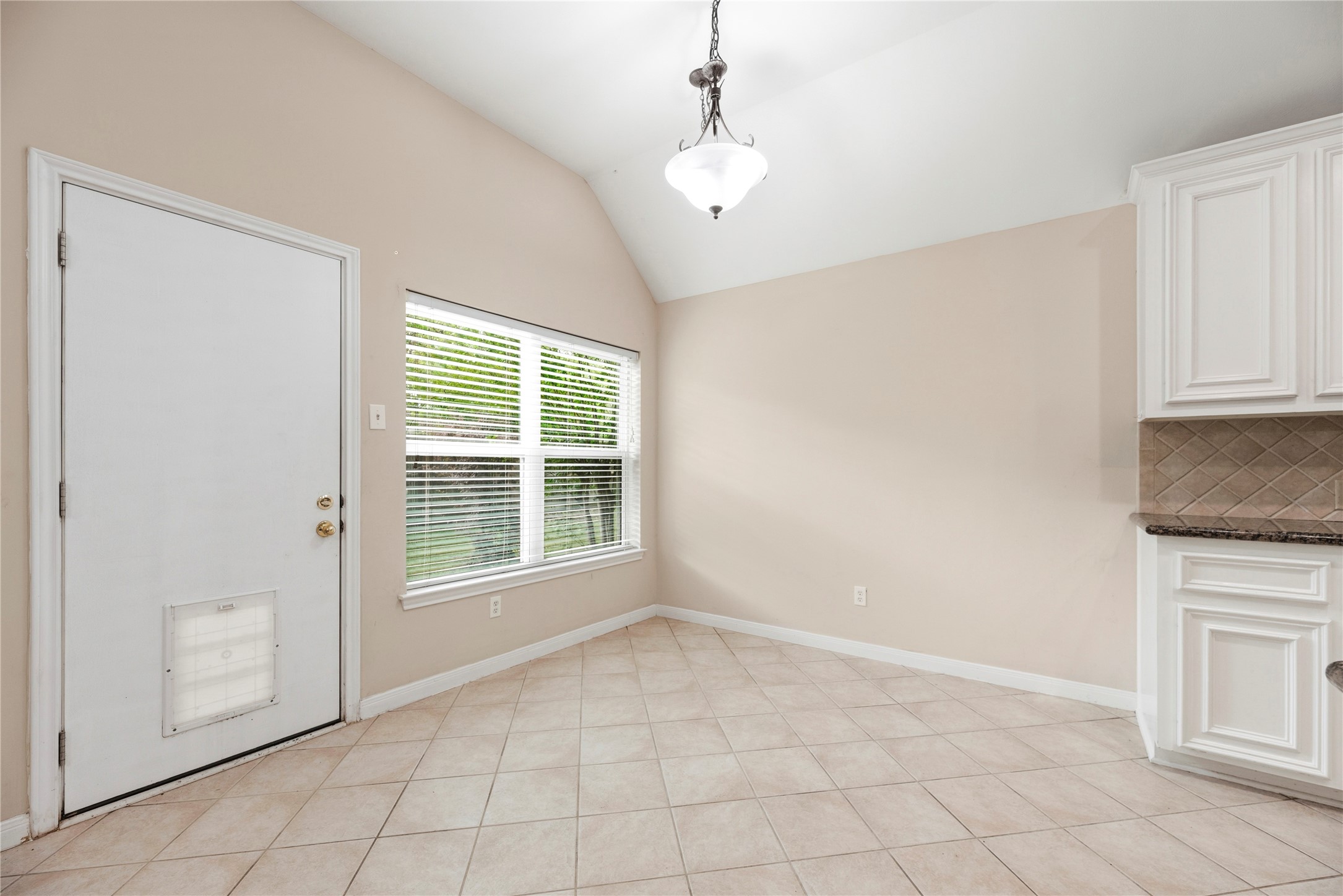 11619 Cedarvale Lane Tomball, TX 77377 - Photo 11 of 32 a view of an empty room with a window