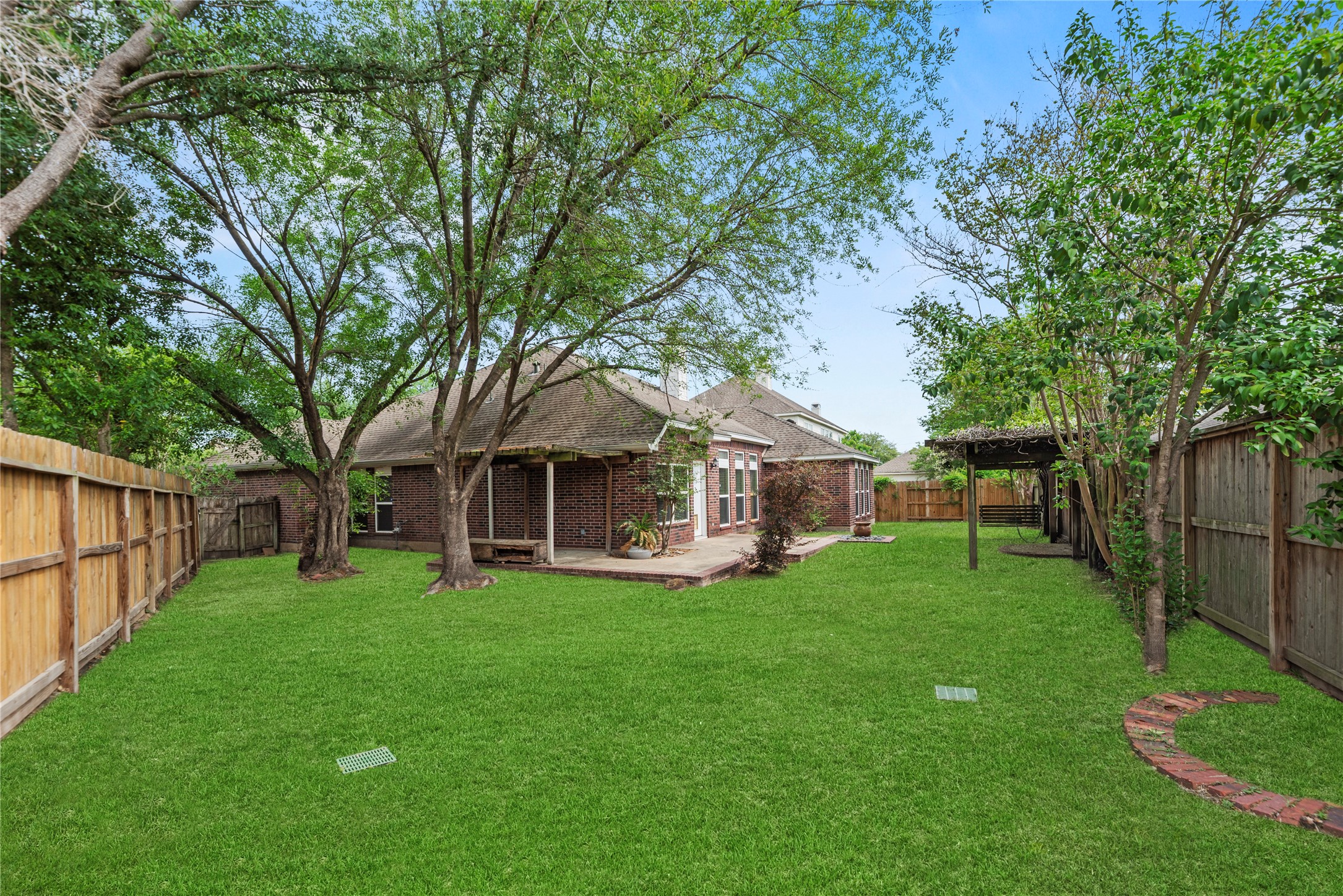 11619 Cedarvale Lane Tomball, TX 77377 - Photo 13 of 32 a view of a house with a yard