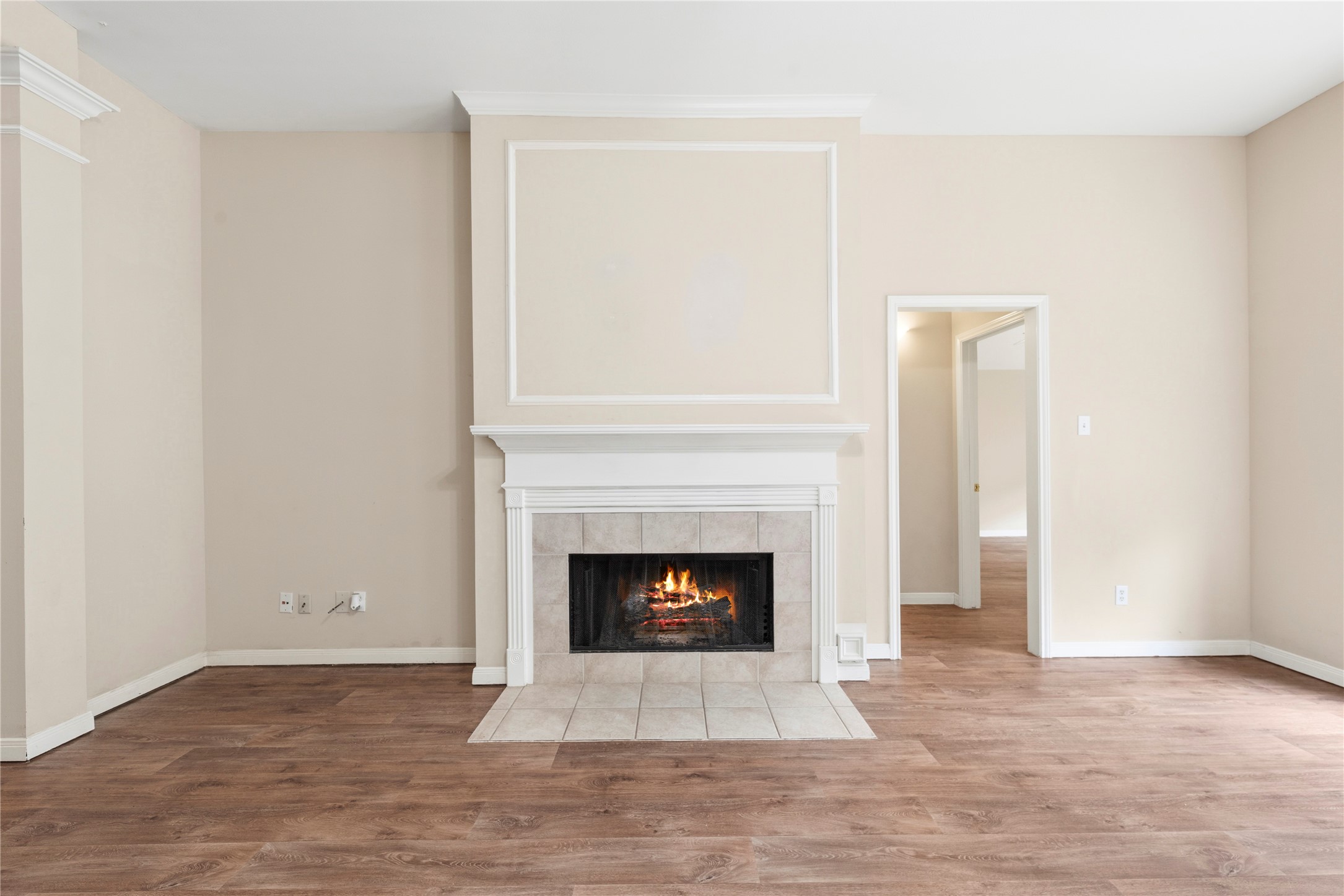 11619 Cedarvale Lane Tomball, TX 77377 - Photo 17 of 32 a living room with a fireplace