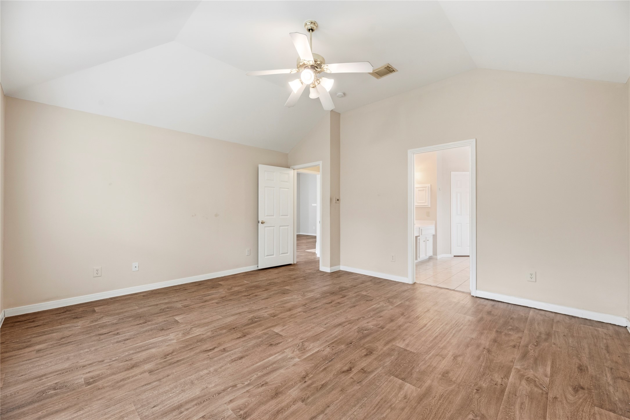 11619 Cedarvale Lane Tomball, TX 77377 - Photo 18 of 32 a view of an empty room with wooden floor