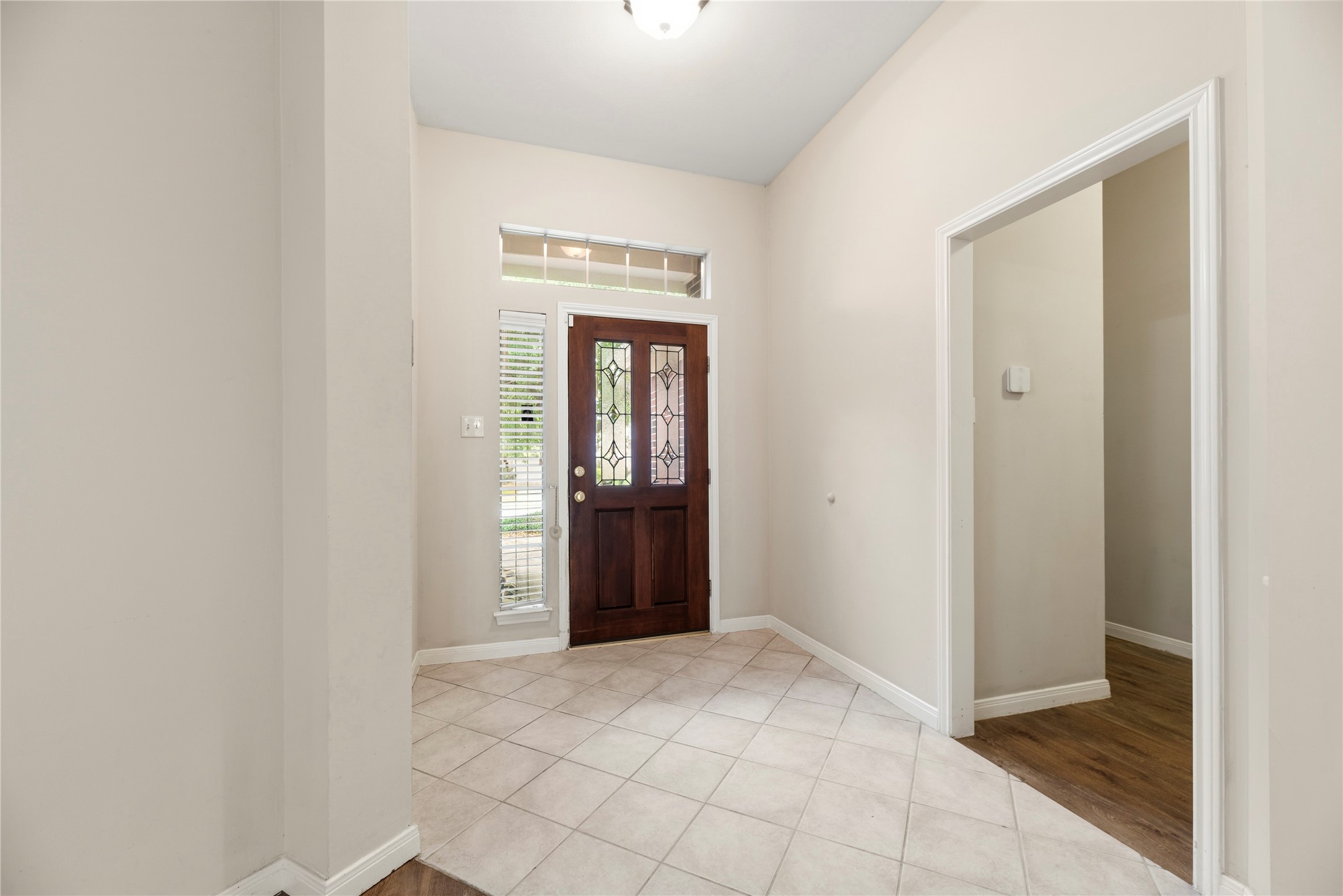 11619 Cedarvale Lane Tomball, TX 77377 - Photo 25 of 32 a view of an empty room with closet and wooden floor