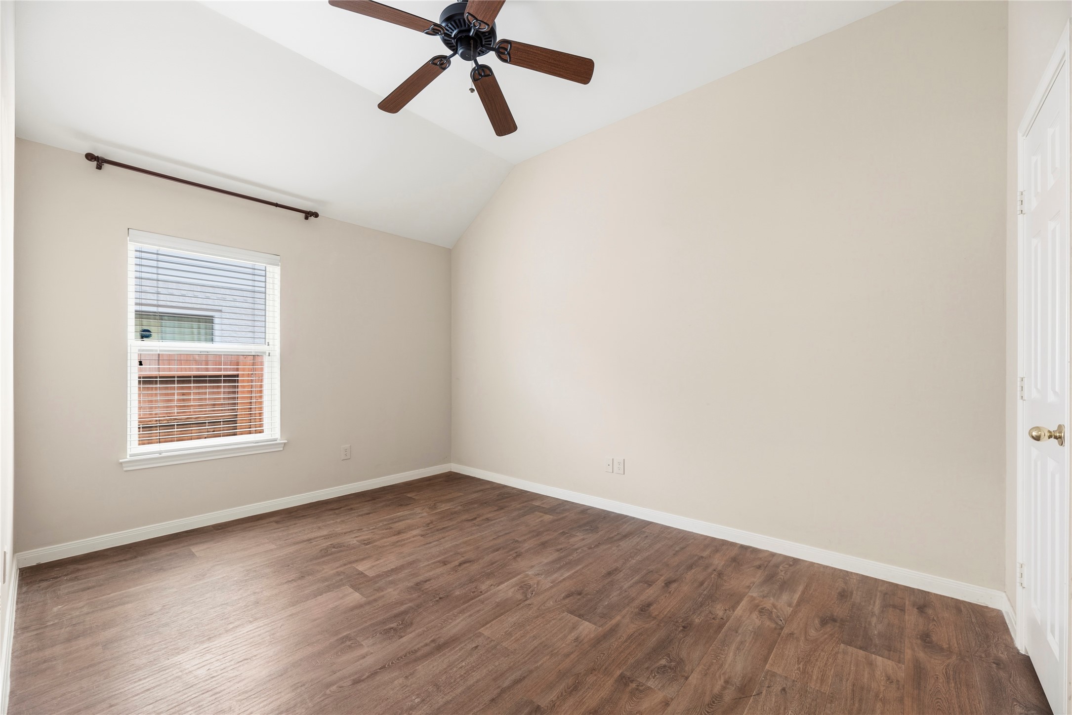 11619 Cedarvale Lane Tomball, TX 77377 - Photo 28 of 32 a view of a room with wooden floor and windows in a room