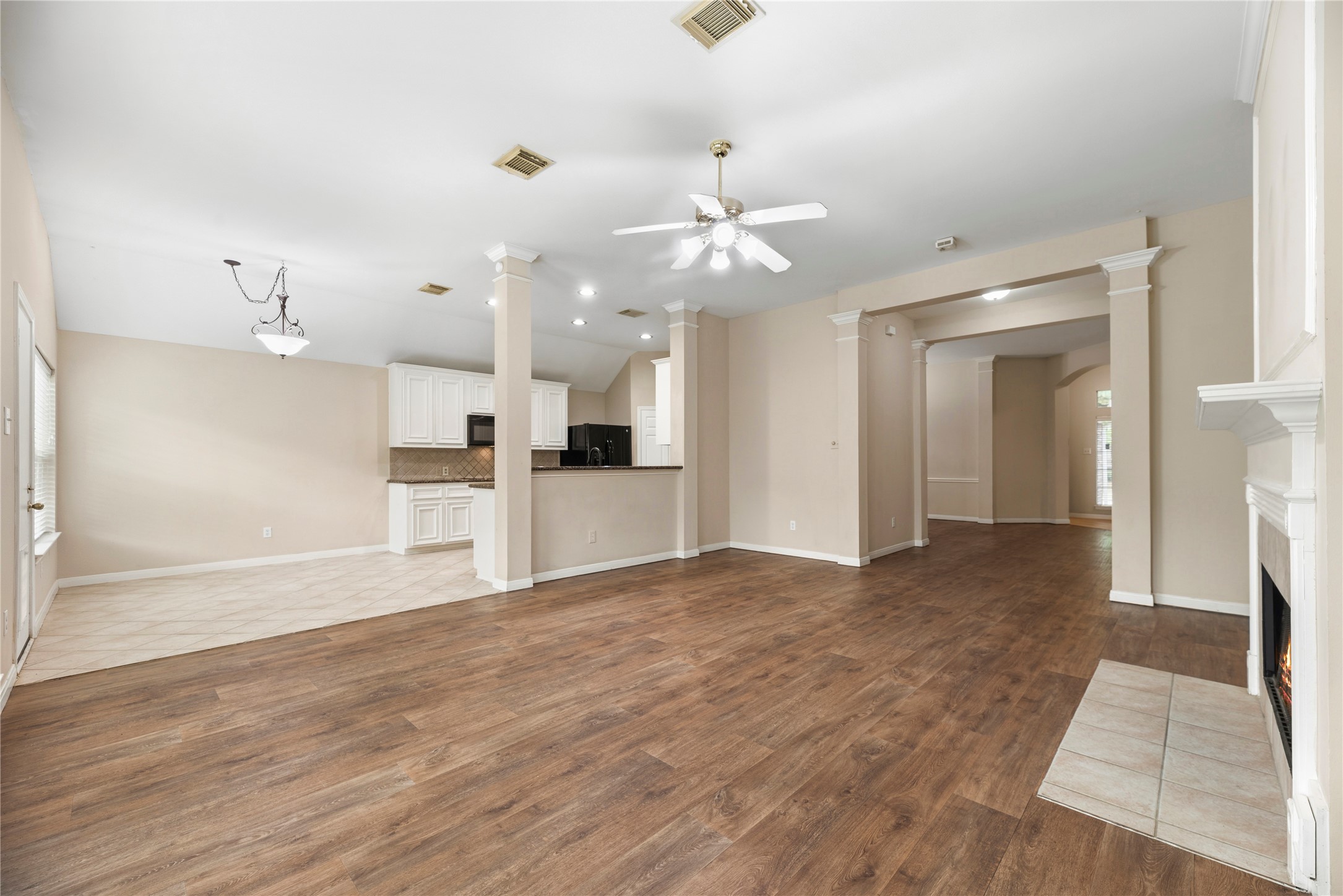11619 Cedarvale Lane Tomball, TX 77377 - Photo 4 of 32 a view of a kitchen with a sink and a stove