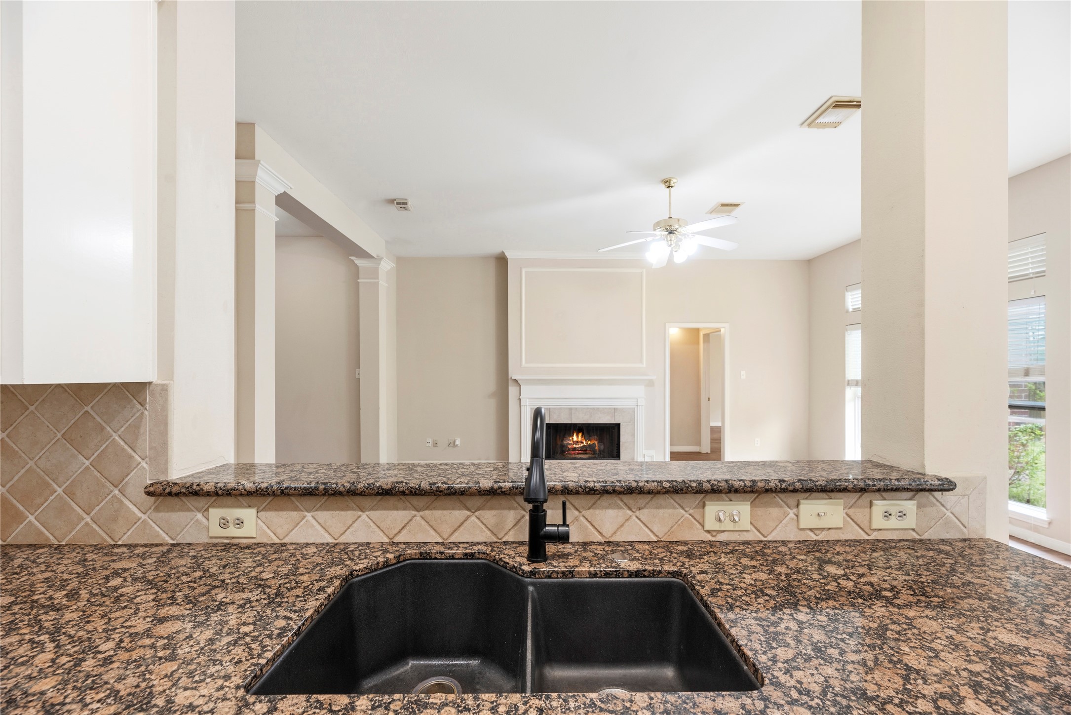11619 Cedarvale Lane Tomball, TX 77377 - Photo 9 of 32 a bathroom with a granite countertop sink a vanity and a mirror