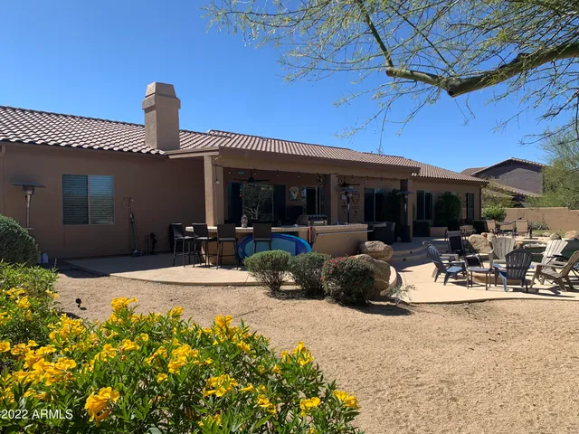 a view of a wooden floor and a yard