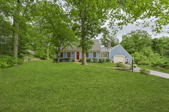 a front view of a house with an outdoor space