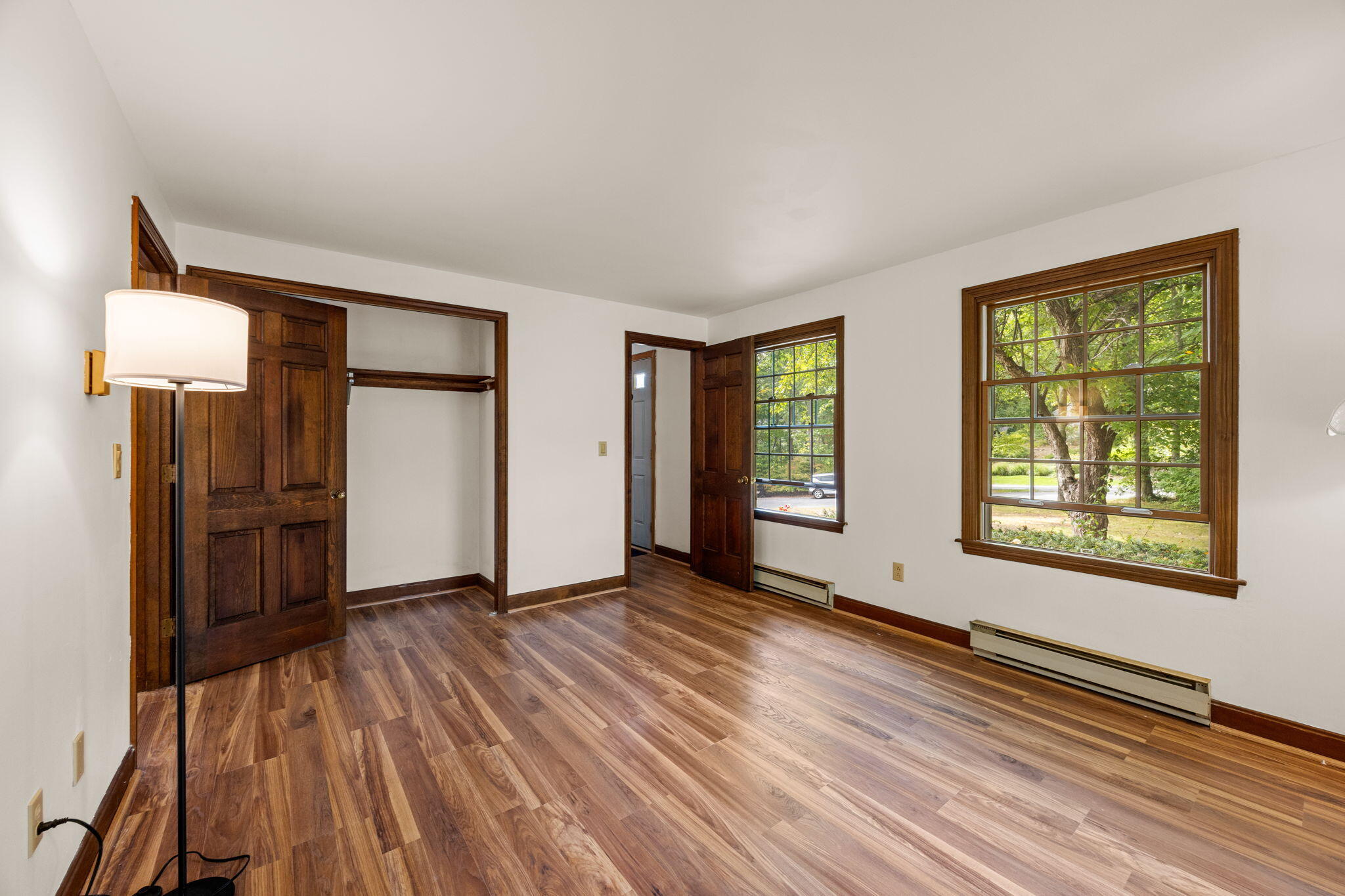 7 Horseshoe Circle Sandwich, MA 02563 - Photo 29 of 92 an empty room with windows and wooden floor