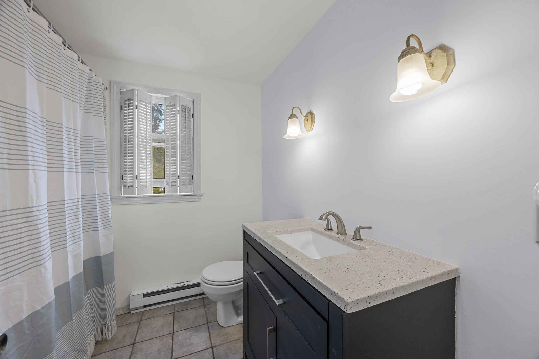 7 Horseshoe Circle Sandwich, MA 02563 - Photo 35 of 92 a bathroom with a sink toilet and mirror