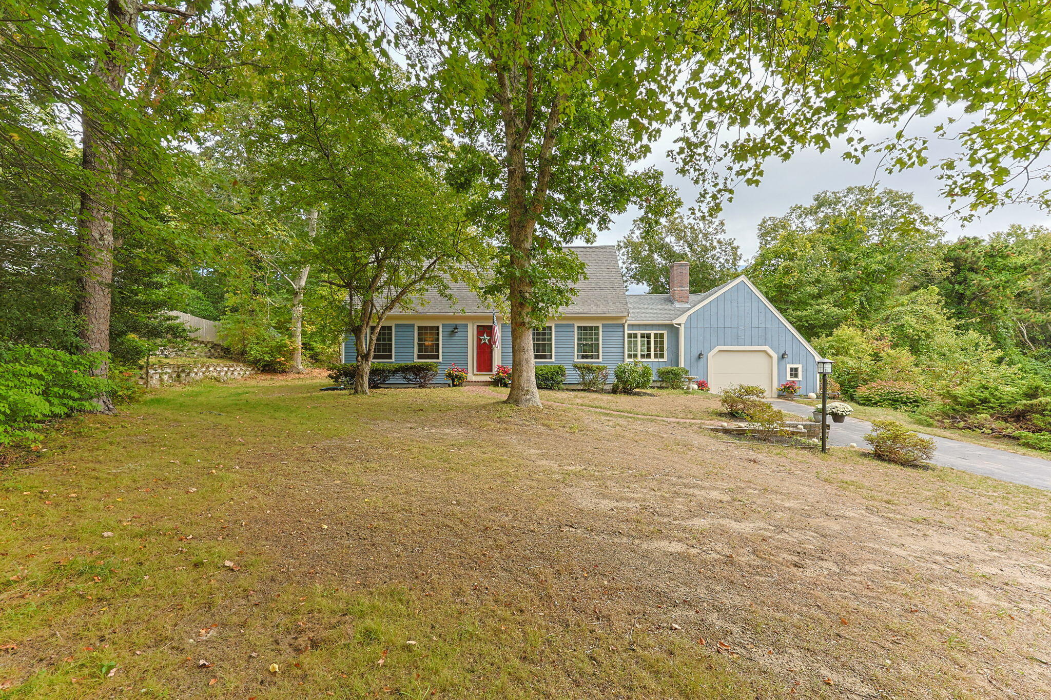 7 Horseshoe Circle Sandwich, MA 02563 - Photo 4 of 92 a front view of a house with yard and green space