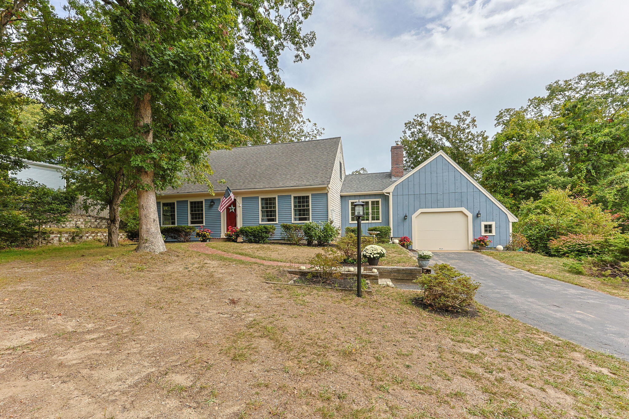 7 Horseshoe Circle Sandwich, MA 02563 - Photo 5 of 92 a front view of a house with a yard