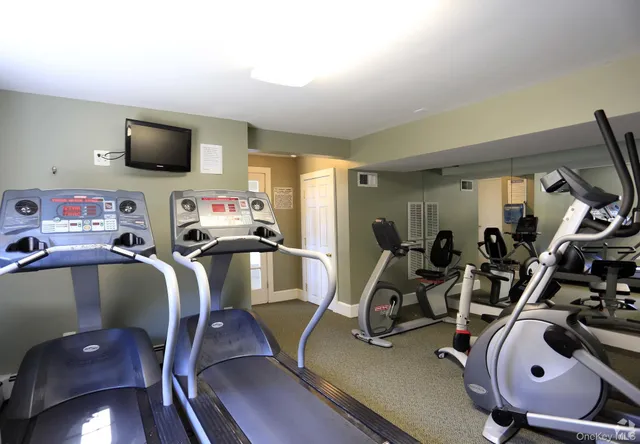 a view of a room with gym equipment