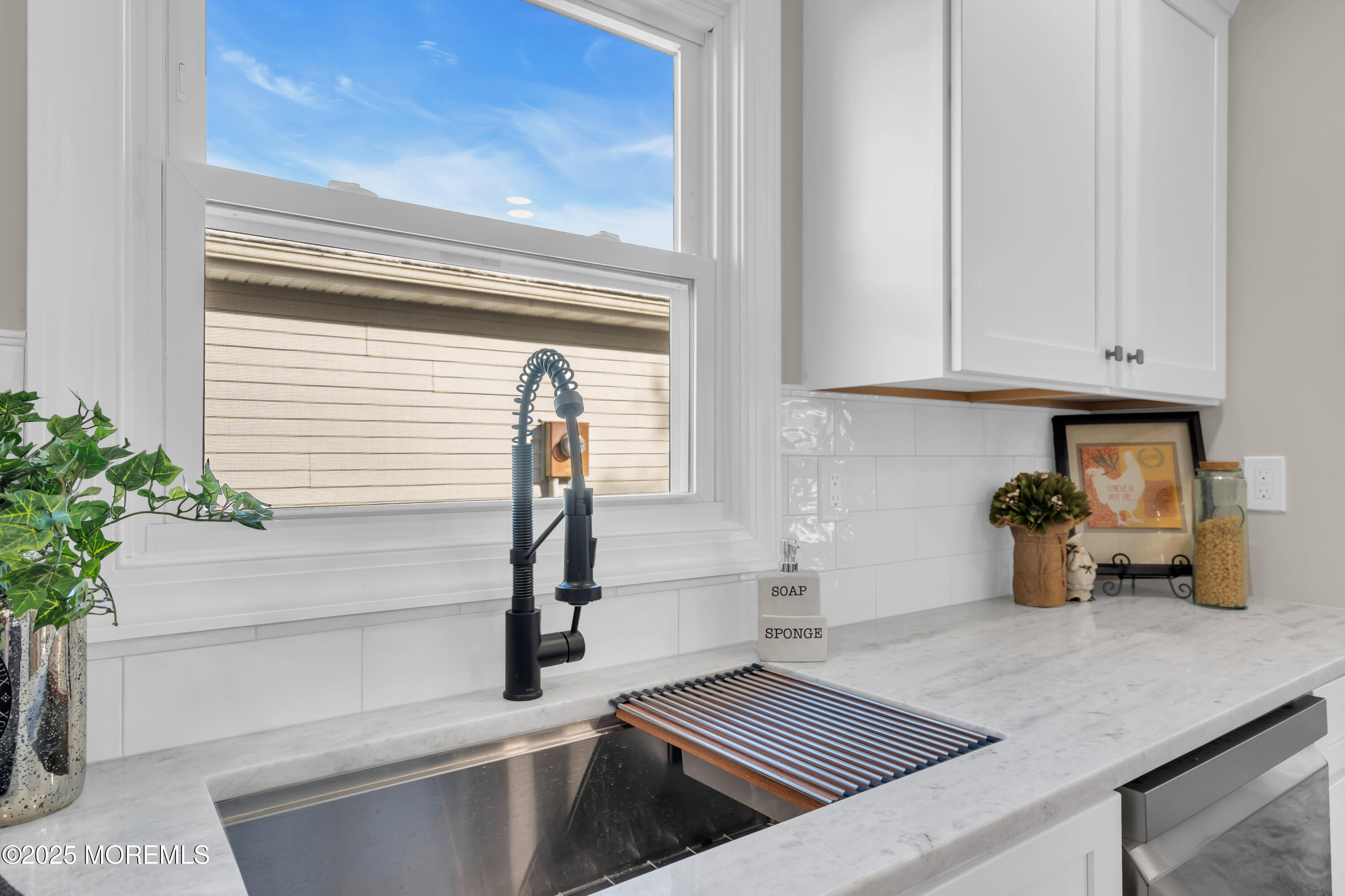 18 Meadowbrook Road Brick, NJ 08723 - Photo 15 of 47 a kitchen with a sink and cabinets
