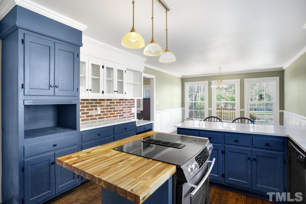 2703 Ridge Road Northwest Wilson, NC 27896 - Photo 13 of 33 a room with a table and chairs in it