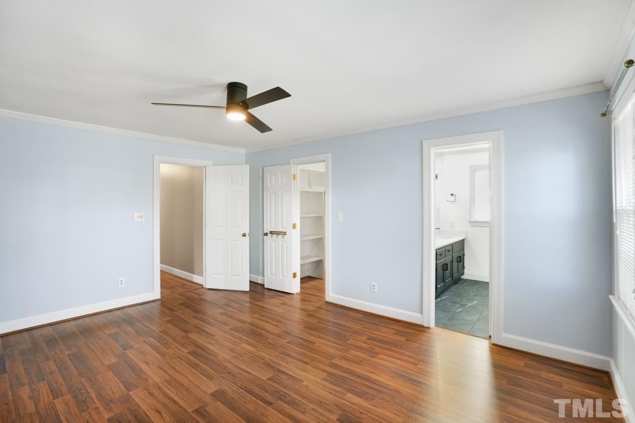 2703 Ridge Road Northwest Wilson, NC 27896 - Photo 18 of 33 a view of an empty room with wooden floor