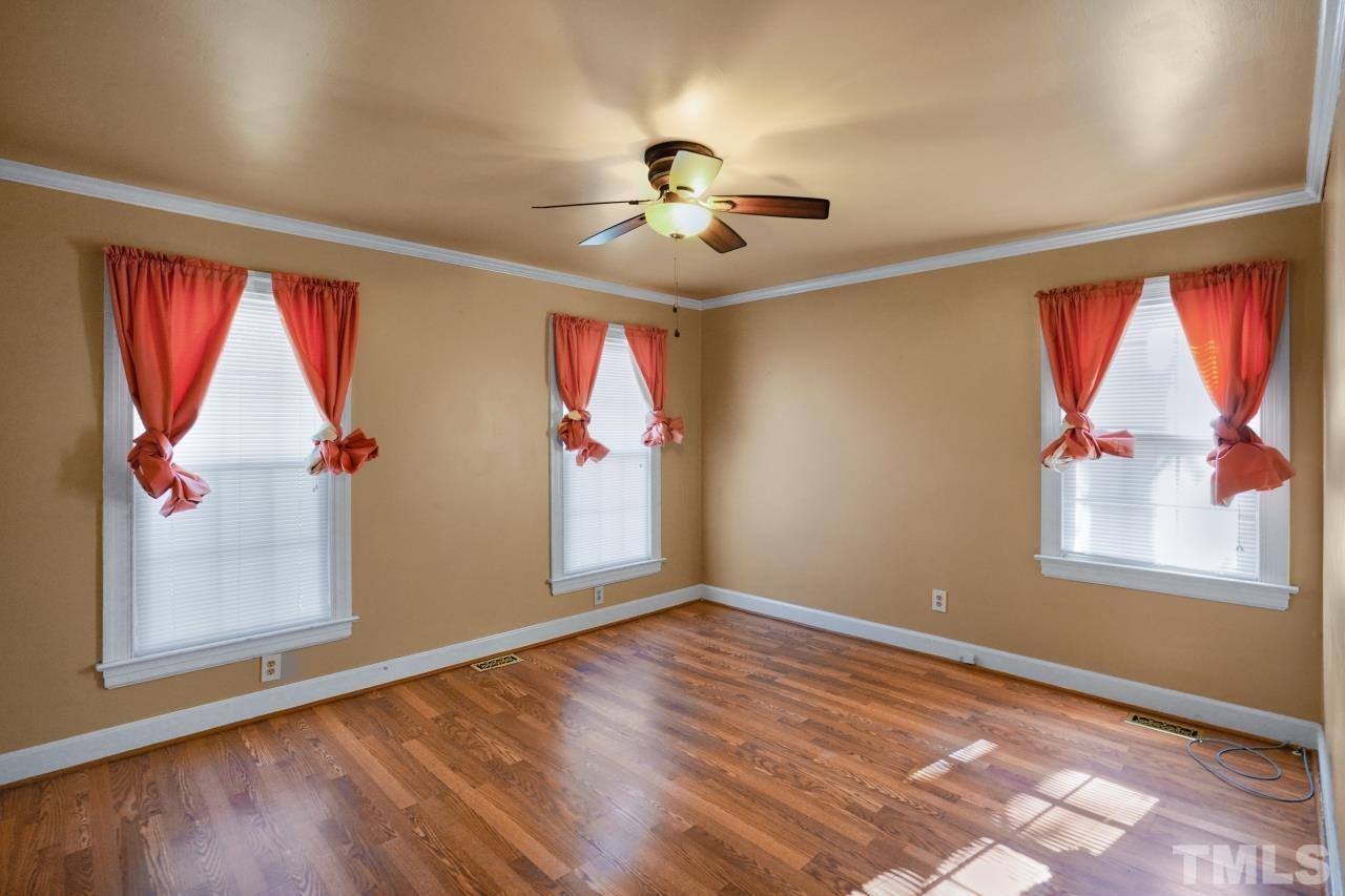 2703 Ridge Road Northwest Wilson, NC 27896 - Photo 26 of 33 an empty room with windows and cabinet