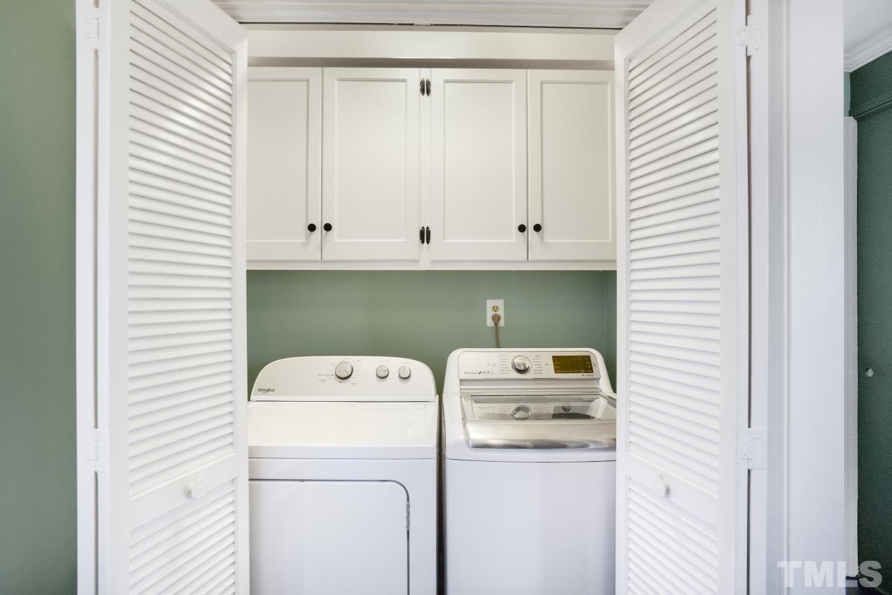 2703 Ridge Road Northwest Wilson, NC 27896 - Photo 27 of 33 a utility room with dryer and washer