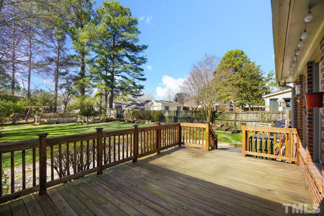 2703 Ridge Road Northwest Wilson, NC 27896 - Photo 28 of 33 a view of a street with a bench next to a road