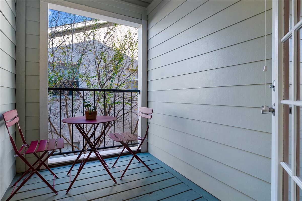 2104 Cullen Avenue, Unit 7204 Austin, TX 78757 - Photo 13 of 40 a view of a balcony with chairs