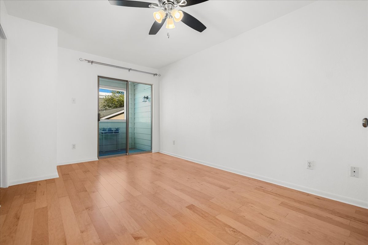 2104 Cullen Avenue, Unit 7204 Austin, TX 78757 - Photo 19 of 40 a view of empty room with ceiling fan