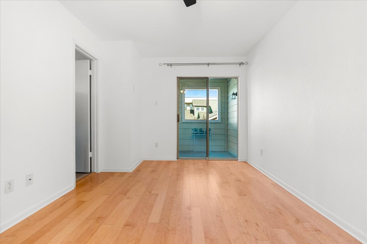 2104 Cullen Avenue, Unit 7204 Austin, TX 78757 - Photo 21 of 40 a bedroom with a bed and closet
