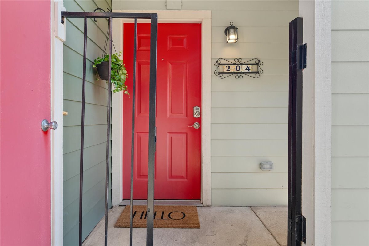 2104 Cullen Avenue, Unit 7204 Austin, TX 78757 - Photo 3 of 40 a view of a wooden door