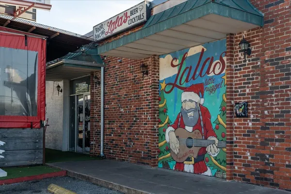a car parked in front of a building