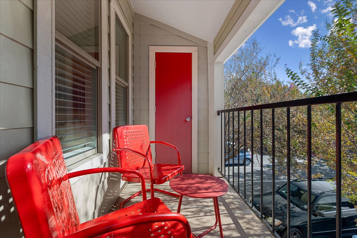 2104 Cullen Avenue, Unit 7204 Austin, TX 78757 - Photo 4 of 40 a view of a chairs and table in the balcony