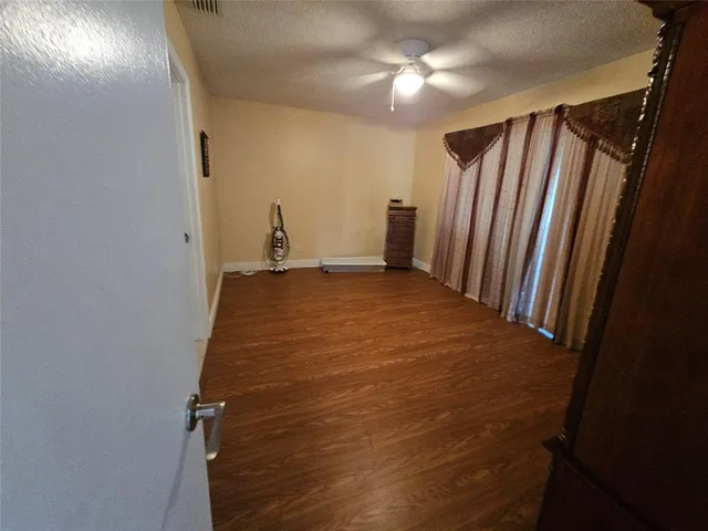 a view of a room with a fireplace