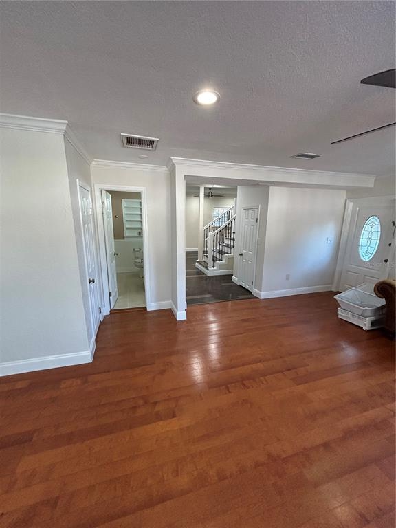 8006 North Rome Avenue Tampa, FL 33604 - Photo 14 of 43 a view of empty room with wooden floor
