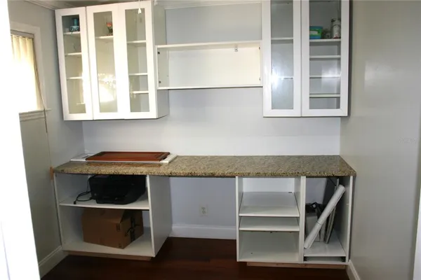 a living room with a flat screen tv