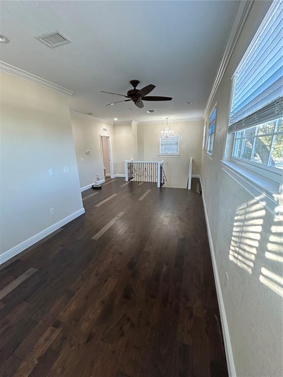 8006 North Rome Avenue Tampa, FL 33604 - Photo 27 of 43 an empty room with wooden floor and windows