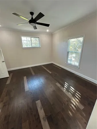 a view of livingroom and hardwood floor