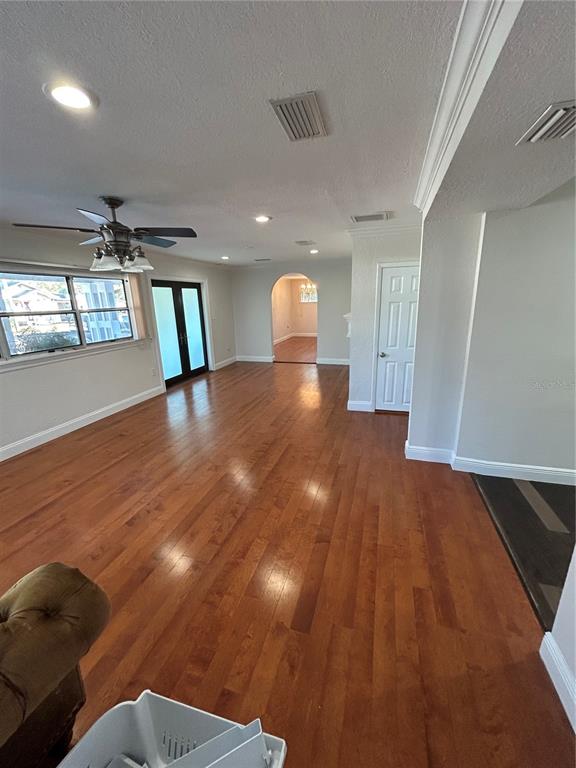 8006 North Rome Avenue Tampa, FL 33604 - Photo 7 of 43 a view of a room with wooden floor