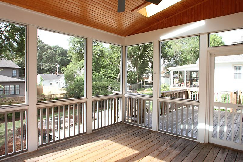 508 Mial Street Raleigh, NC 27608 - Photo 22 of 25 The screened porch with headboard ceiling and fan opens to the deck and overlooks the landscaped, fenced yard and parking area which can also serve as additional patio. Screened Porch