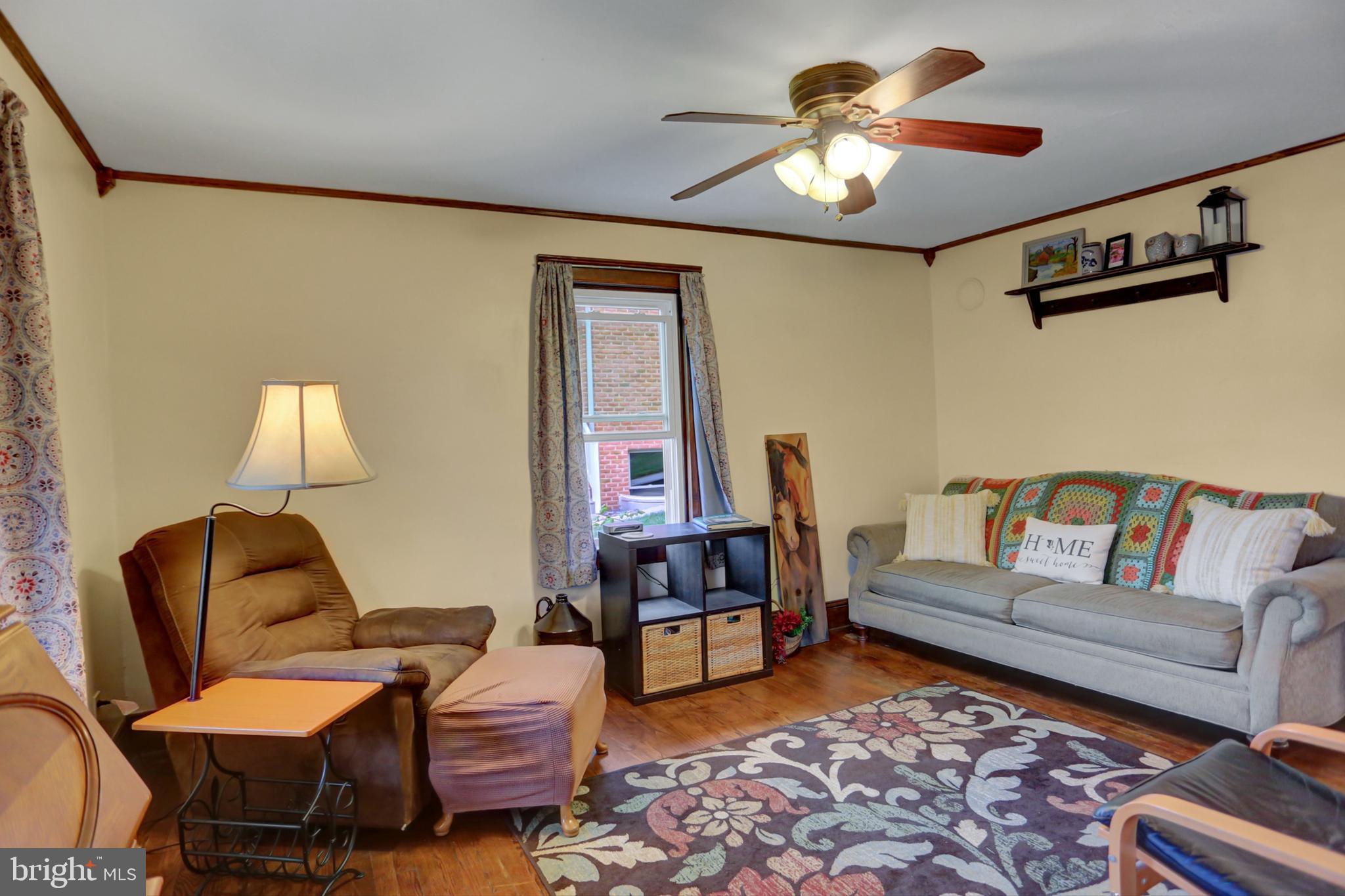 227 South Main Street Boonsboro, MD 21713 - Photo 11 of 53 a living room with furniture and a lamp