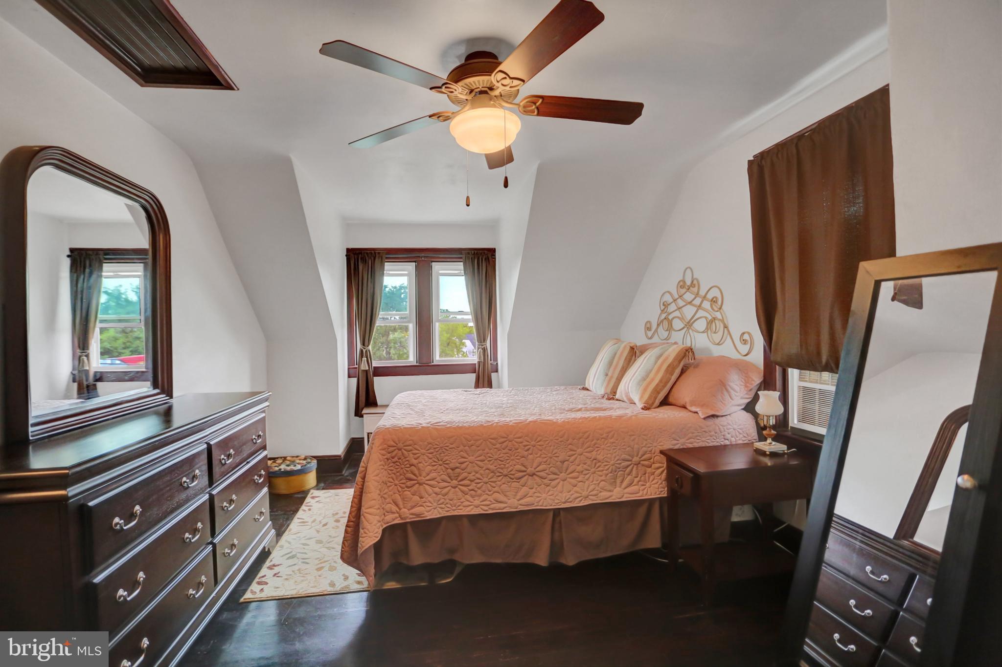 227 South Main Street Boonsboro, MD 21713 - Photo 26 of 53 a bedroom with a bed dresser and a large mirror