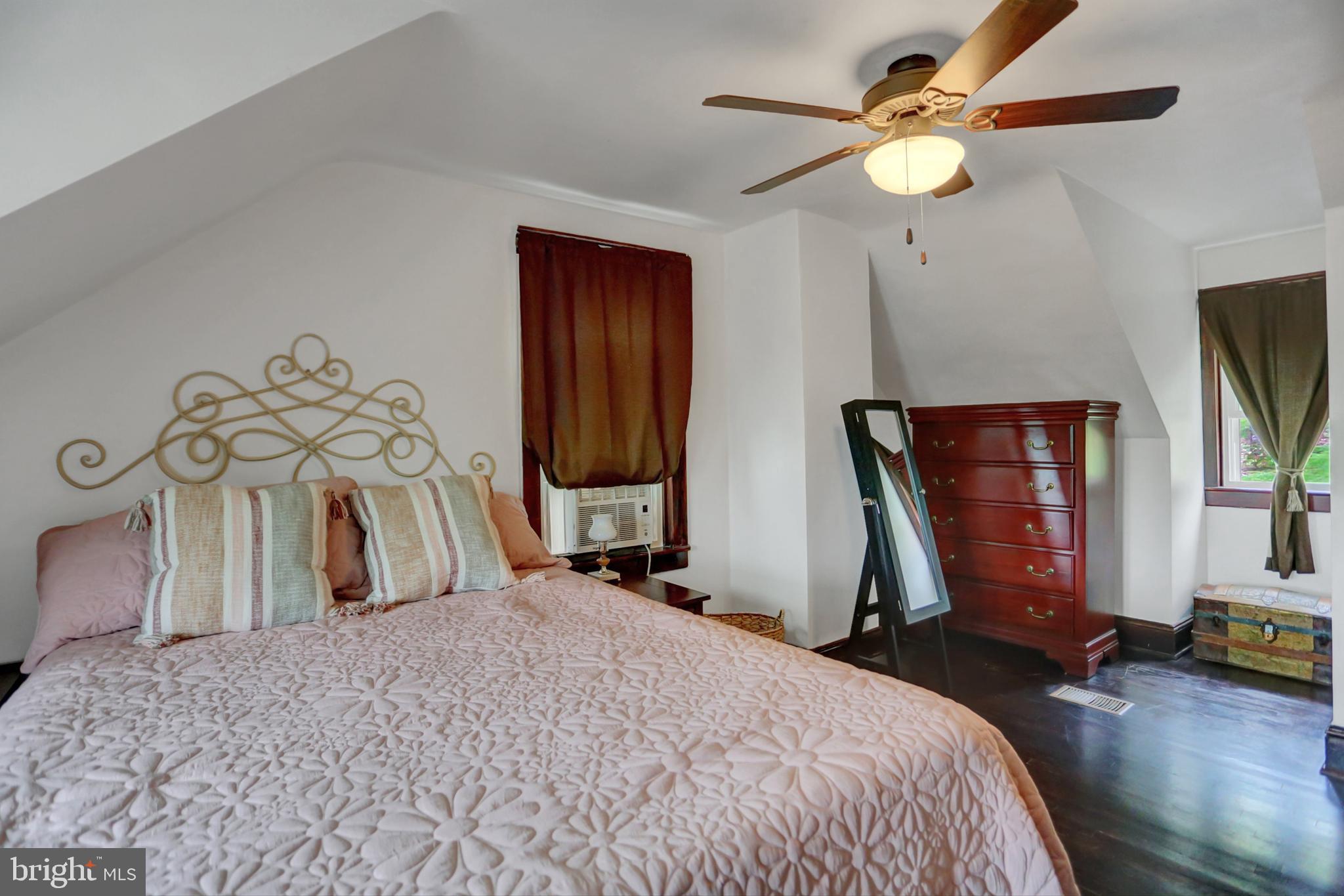 227 South Main Street Boonsboro, MD 21713 - Photo 27 of 53 a bedroom with a bed dresser and a flat tv screen