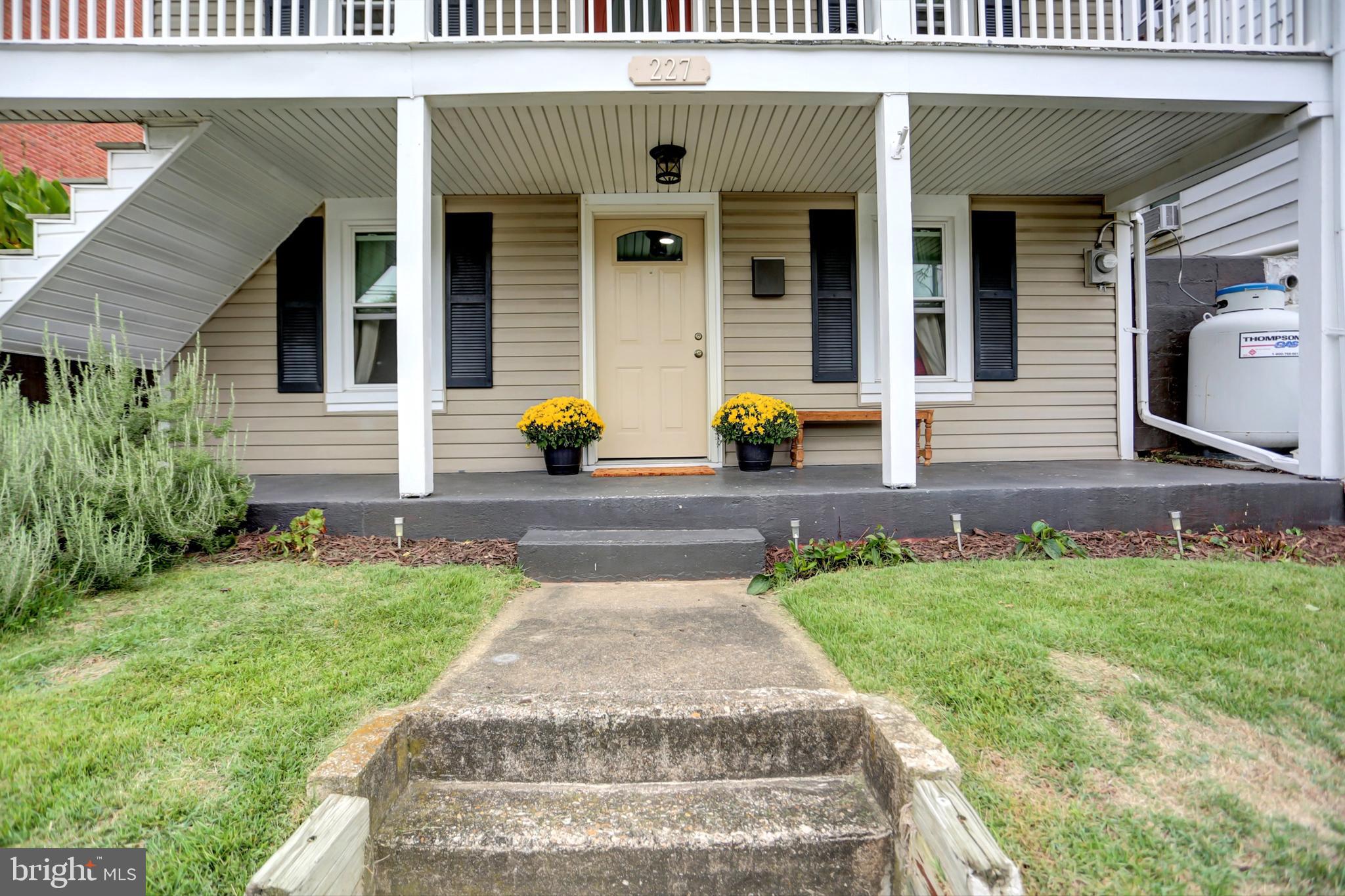 227 South Main Street Boonsboro, MD 21713 - Photo 3 of 53 a front view of a house with garden