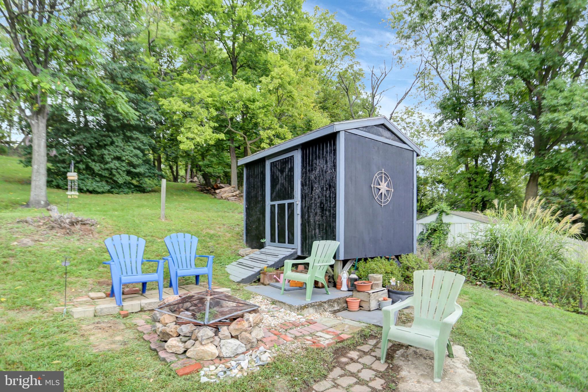 227 South Main Street Boonsboro, MD 21713 - Photo 43 of 53 a backyard of a house with table and chairs