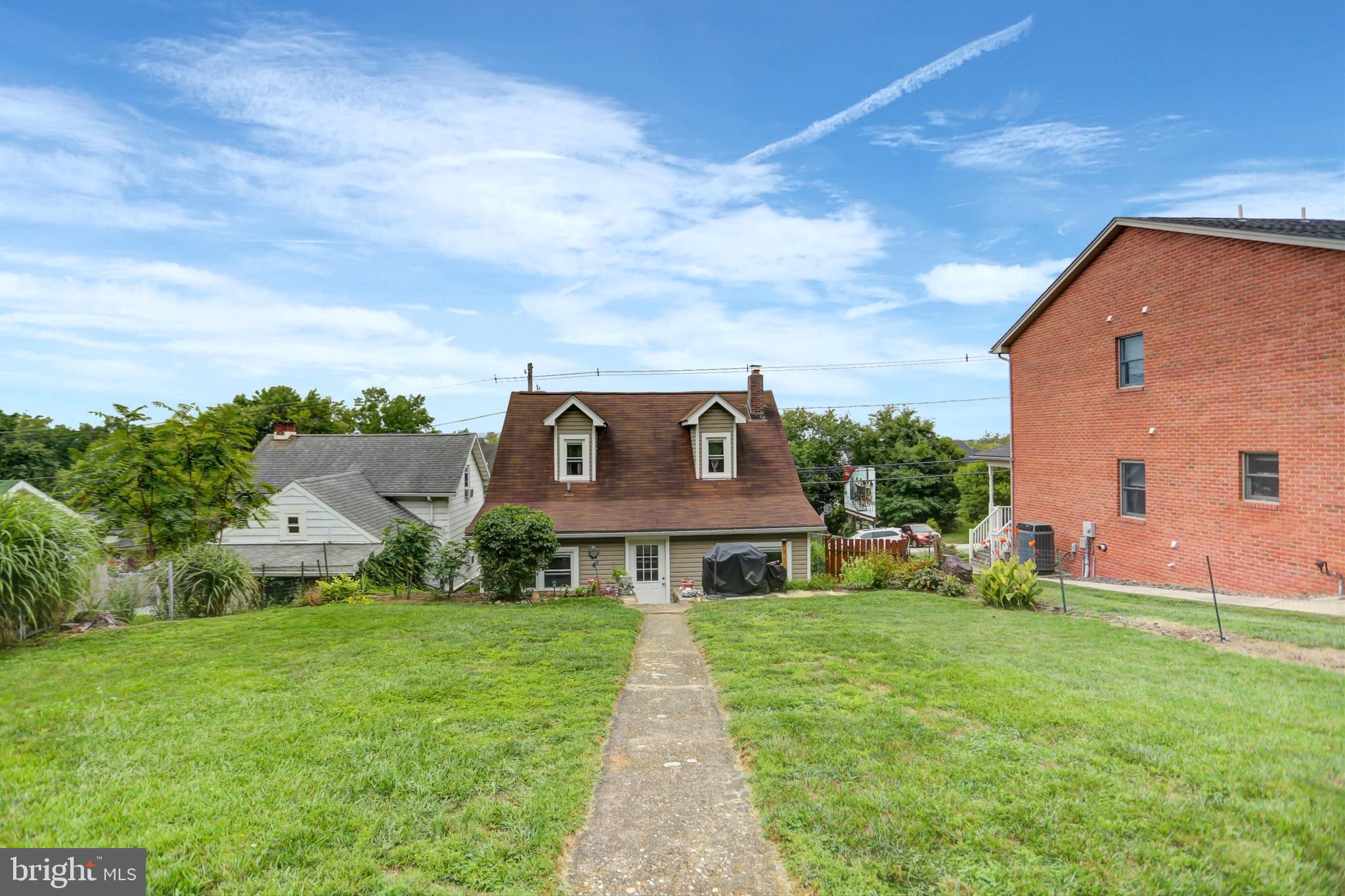 227 South Main Street Boonsboro, MD 21713 - Photo 48 of 53 a front view of a house with garden