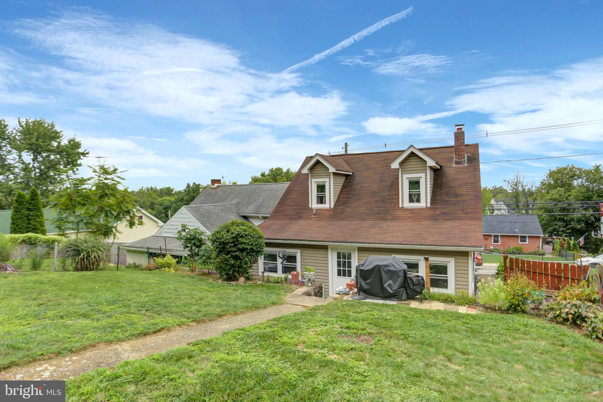 227 South Main Street Boonsboro, MD 21713 - Photo 49 of 53 a brick house with a big yard and front view of a house